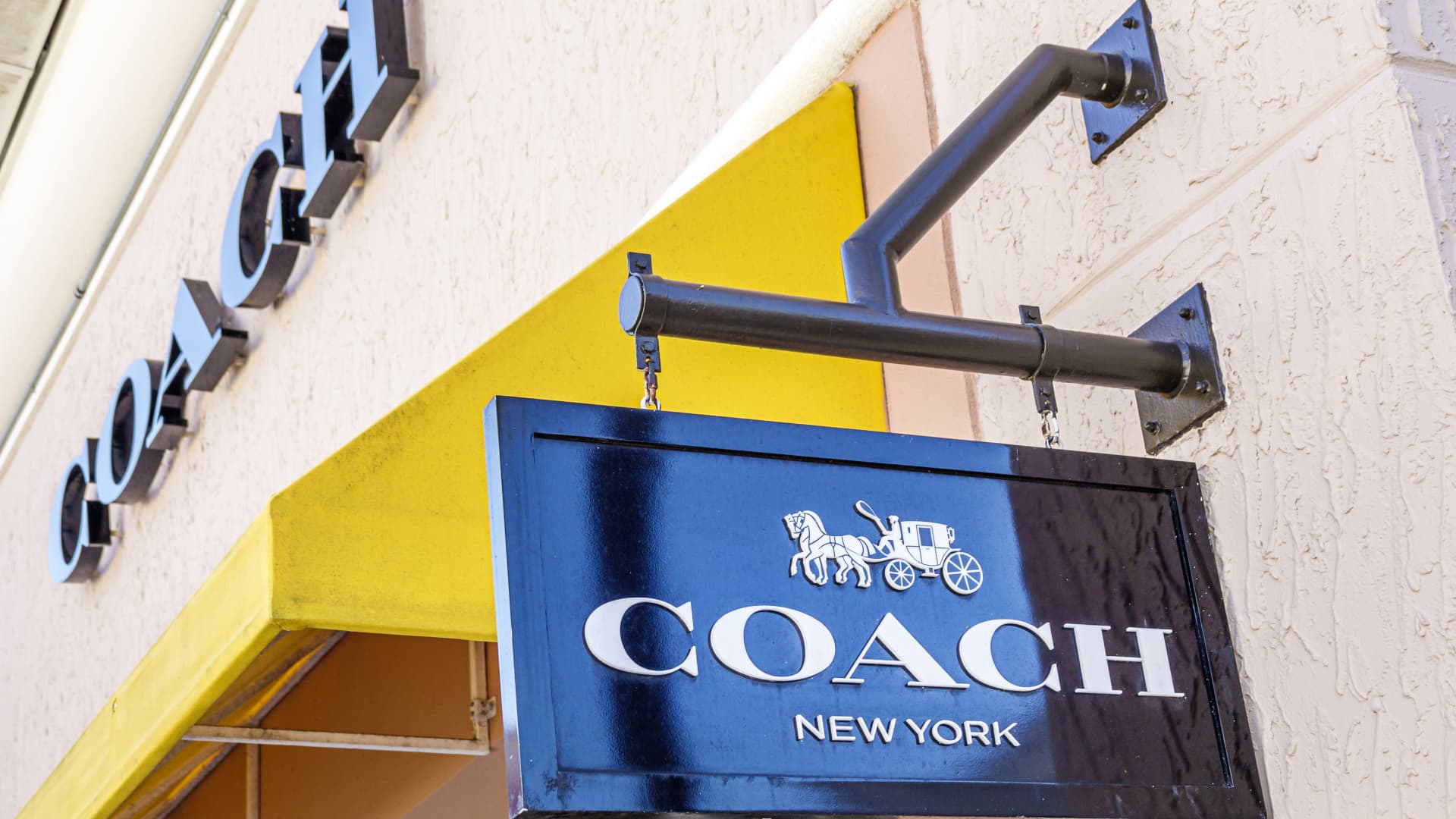 Tapestry shares achieve as Capri slides later income 7