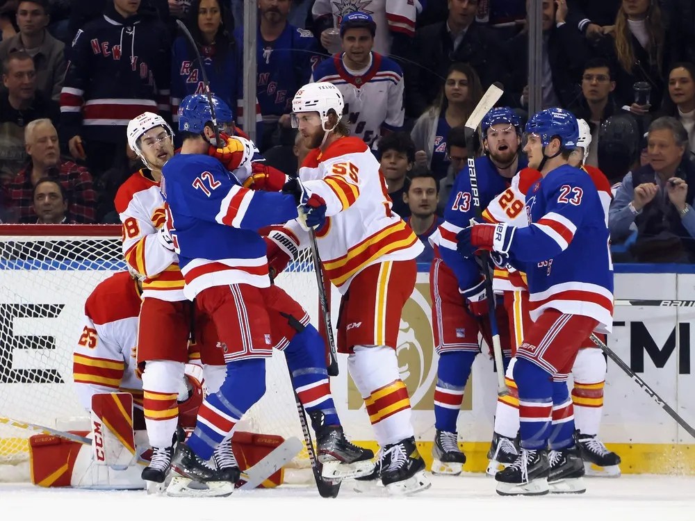 Flames show plenty of struggle after their break in wild OT loss to Rangers 21