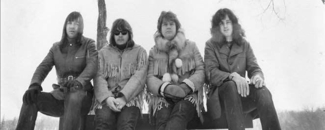 At the back of the band identify: The Supposition Who 3