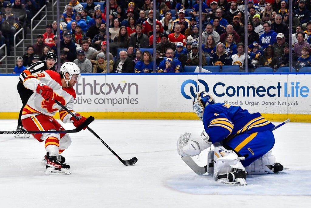 Flames retain a 7-2 win over Sabers 1