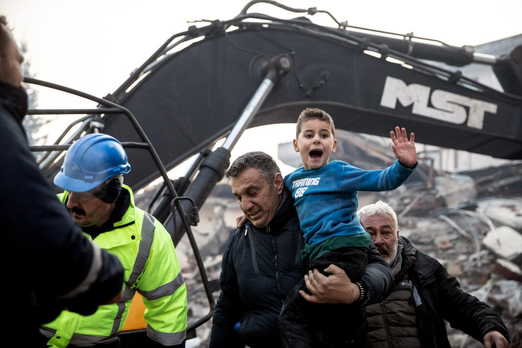 Dramatic pictures display the age an 8-year-old survivor was once rescued and reunited together with his mom 1