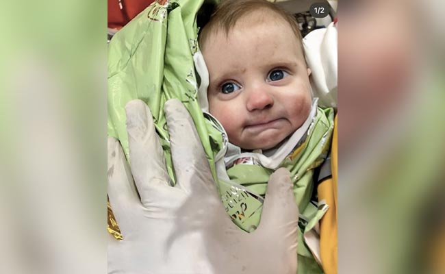 128 hours later the earthquake, a 2-month-old child is rescued from the rubble 11