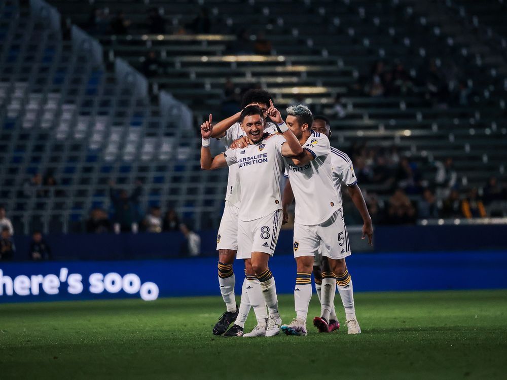 Delgado scores from long-range to sink the former team as Galaxy beat Toronto FC 2-1 3