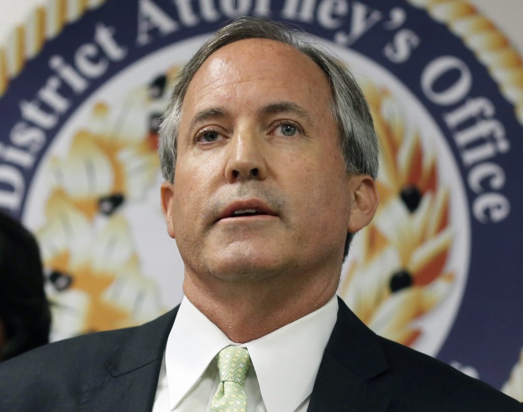 Texas AG settles with former aides who reported him to the FBI 17