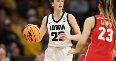 Clark shines as Iowa advances